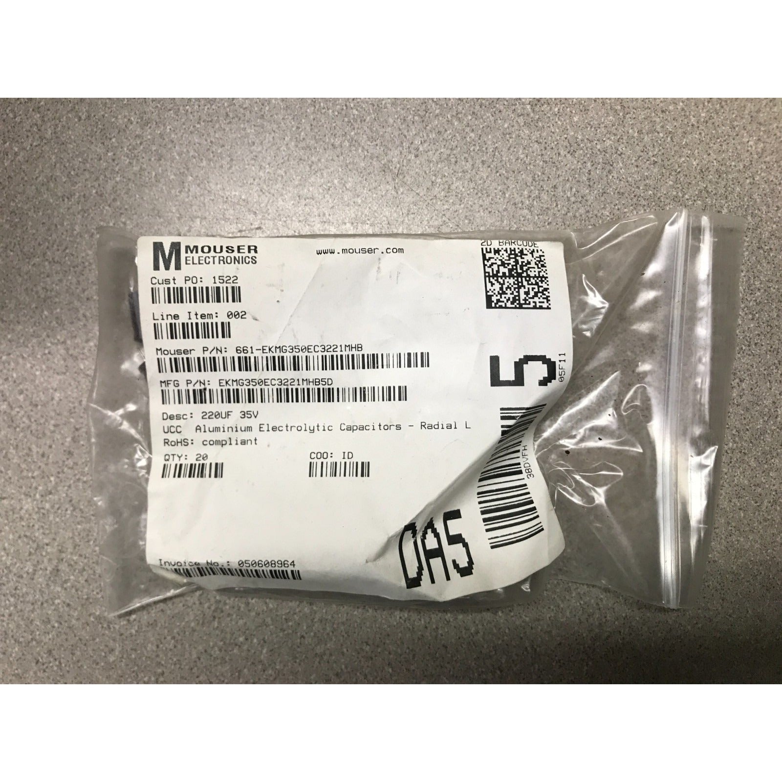 220UF 35V UCC Aluminum Electrolytic Capacitors - Radial Leaded package with product label