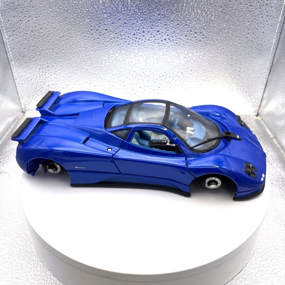 Motor Max Pagani Zonda C12 Blue Die Cast, Scale: 1/18 No. 73147 passenger side view wheels missing