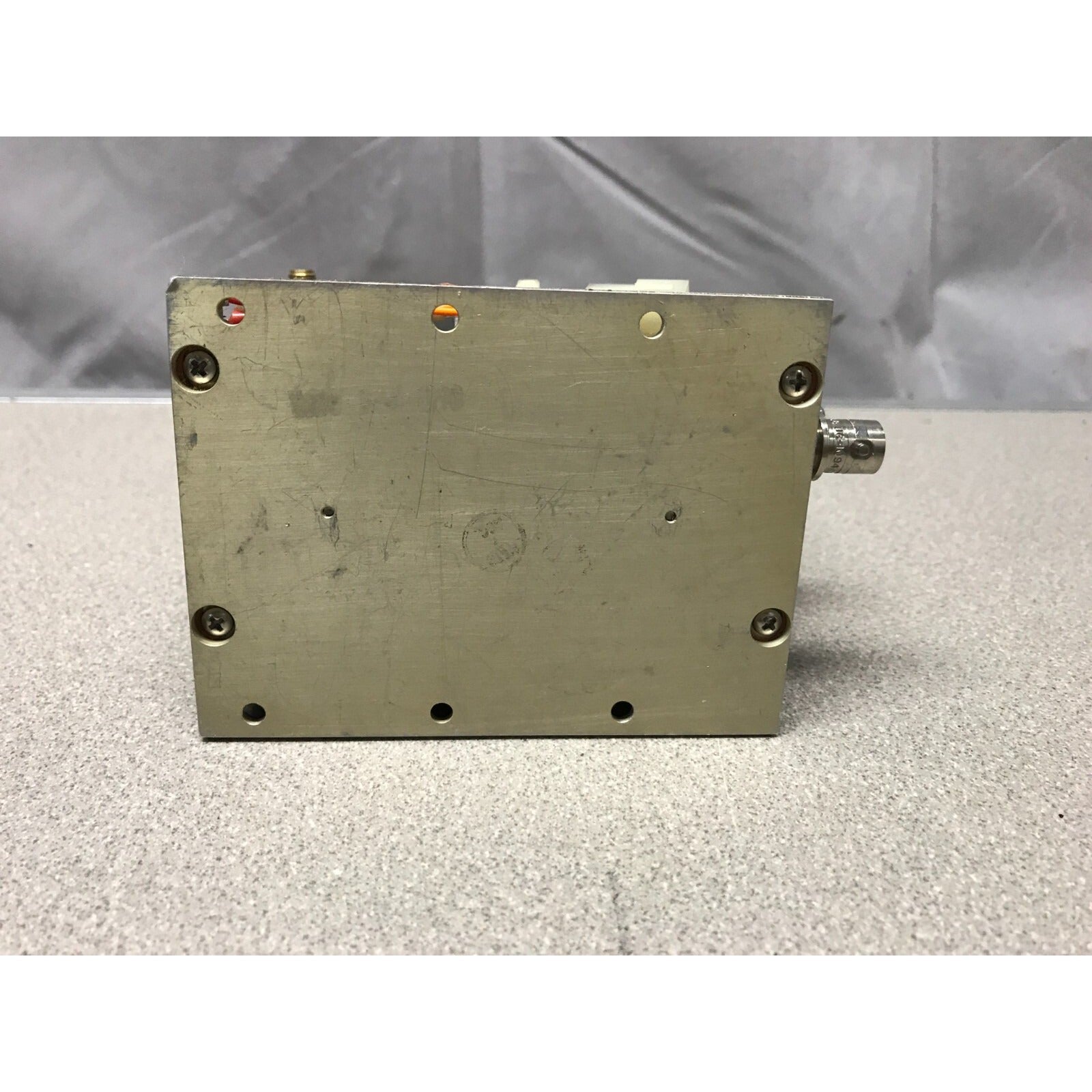 M/A-COM PLC31-05 Phase Lock Source 6460-6940 MHz bottom view with holes for mounting