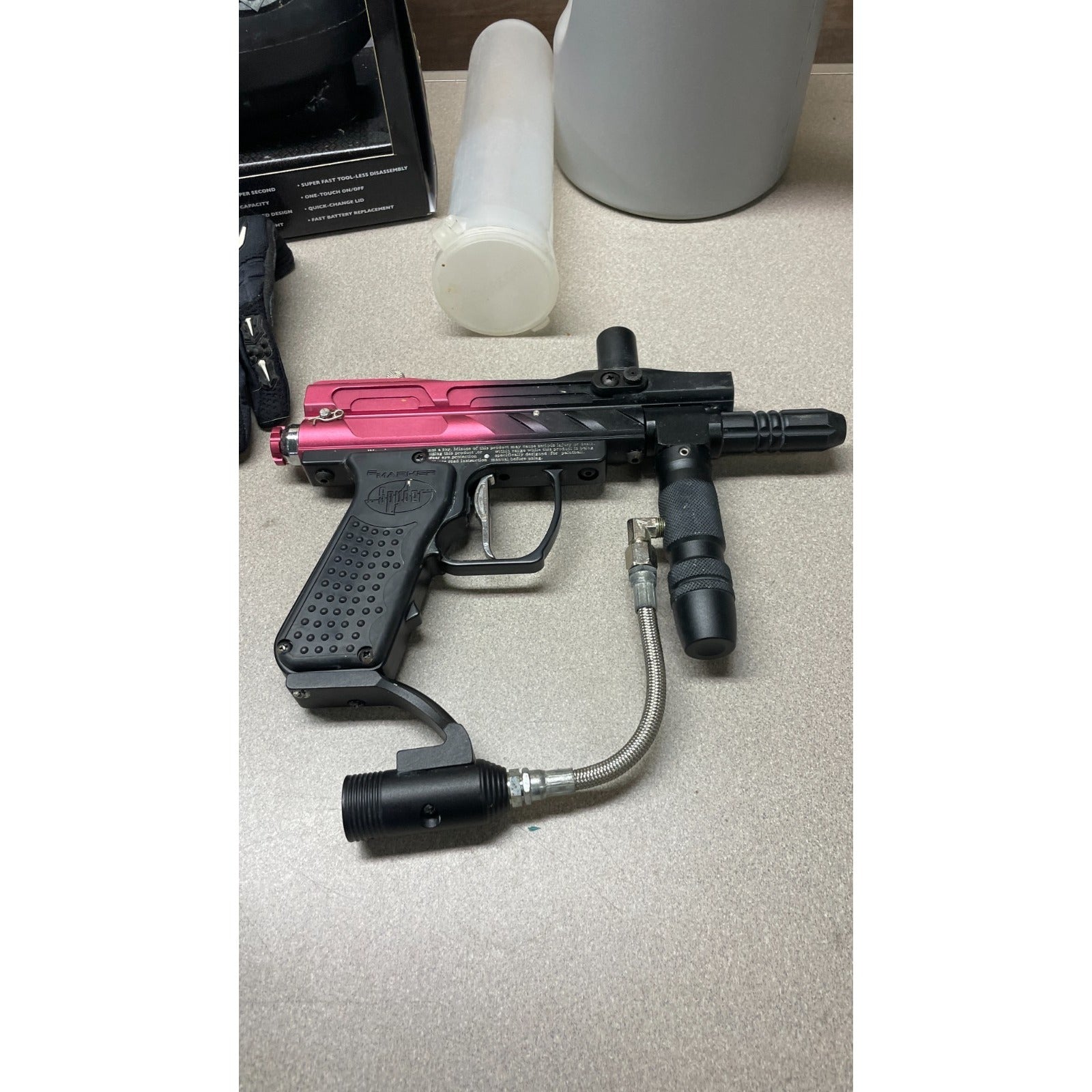 Spyder Pilot ACS Paintball Gun Black/Pink Lot, No Barrel, Accessories Included closeup of paintball gun