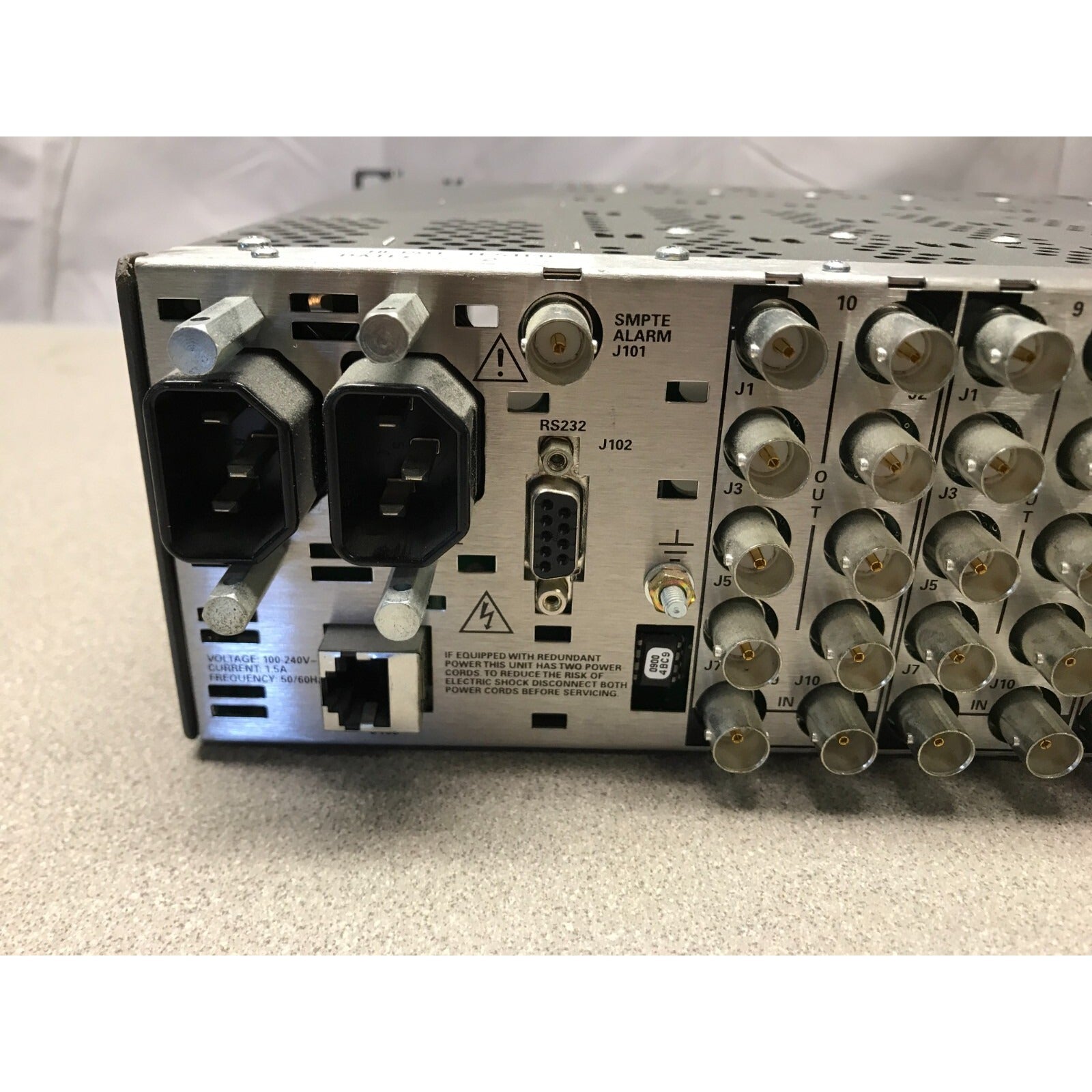 Grass Valley Group 8900 Series Chasis with cards back panel power network monitor and other connectors closeup