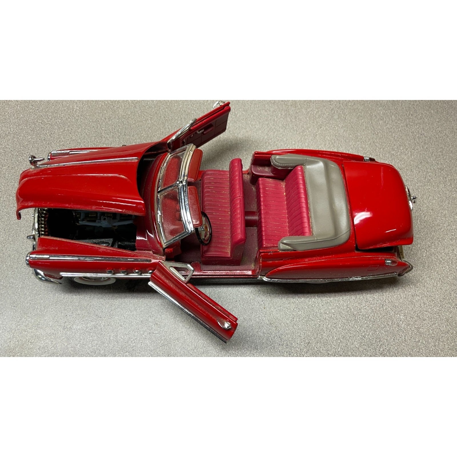 MotorMax 1949 Buick 1:18 Scale Diecast Model overhead view with doors hood and trunk open