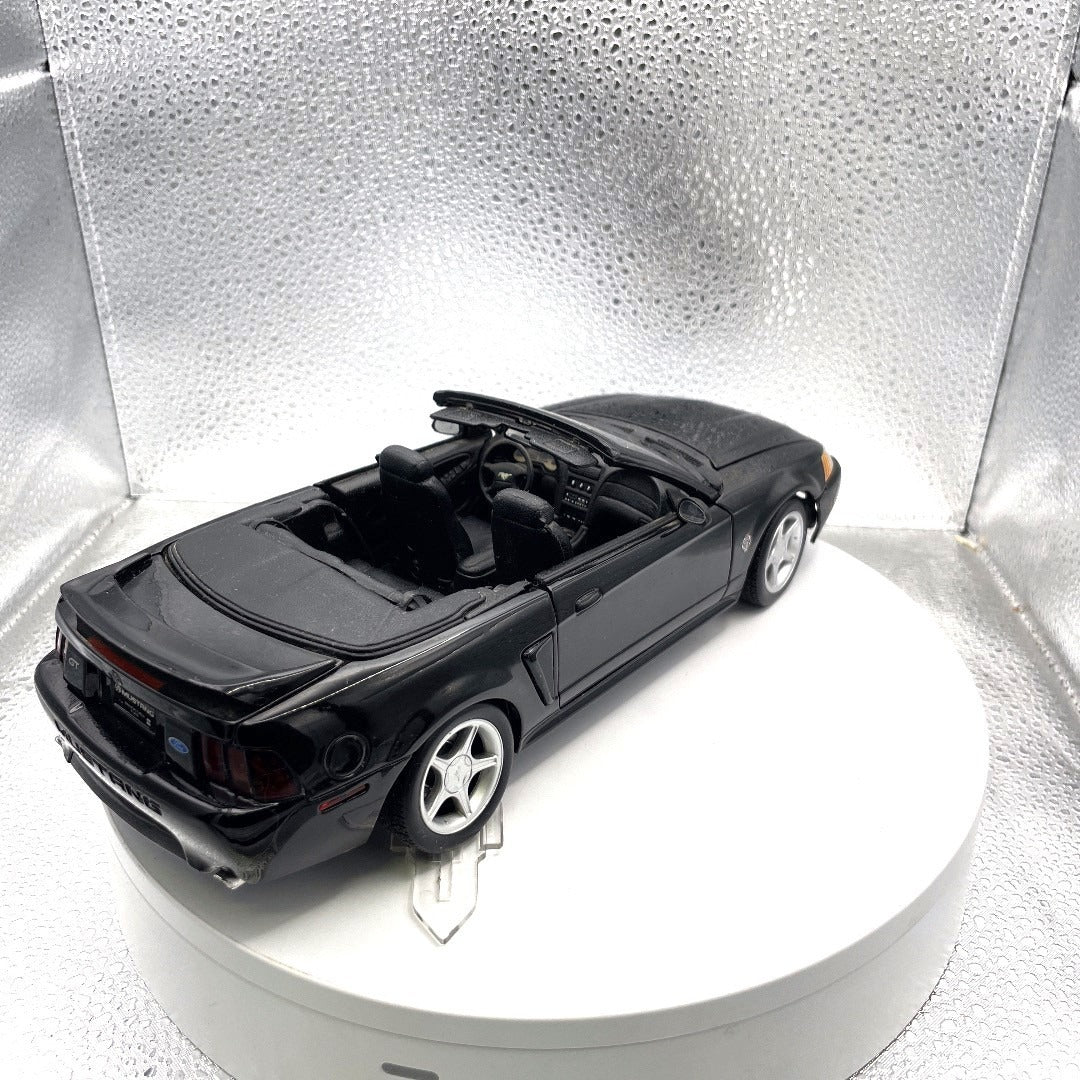 Maisto Mustang GT Black Convertible Die Cast, Scale: 1/18 back end/passenger side view