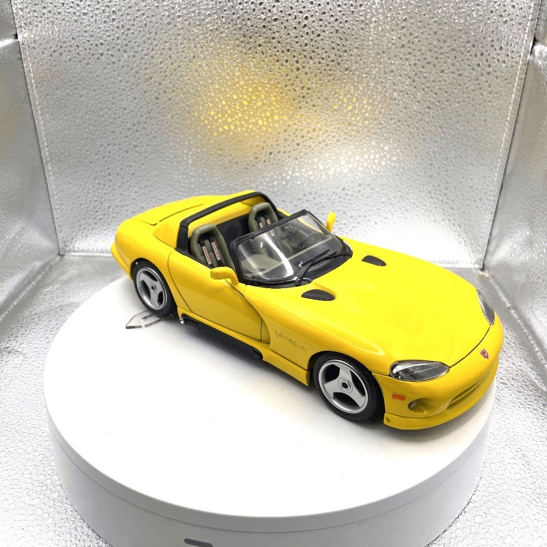 Burago 1993 Dodge Viper RT/10 Yellow Convertible Die Cast, Scale: 1/18 passenger/front end view