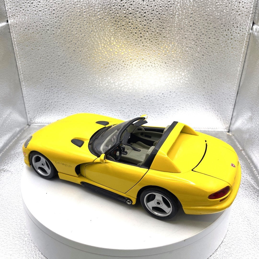 Burago 1993 Dodge Viper RT/10 Yellow Convertible Die Cast, Scale: 1/18 drivers side/back end view