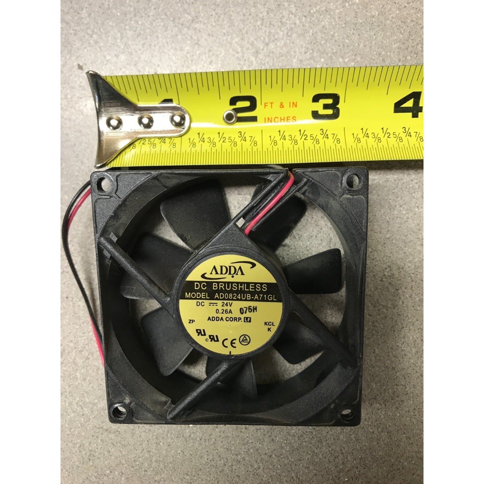 DC Brushless 2 Wire Fan ADDA AD0824UB-A71GL 12VDC measuring tape indicating fan width of approx. 3 1/8 inches