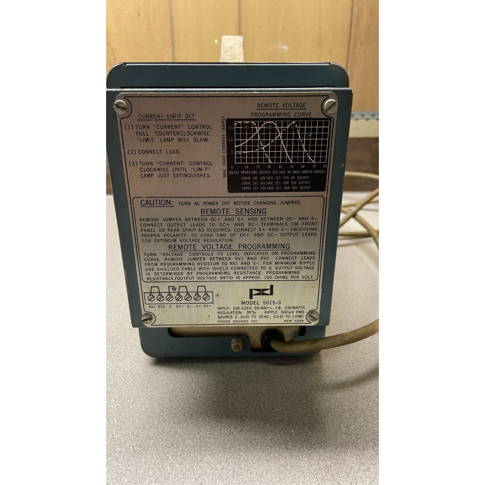 Power Designs Regulated DC Power Supply Model 5015-S back panel view with operational instructions/details