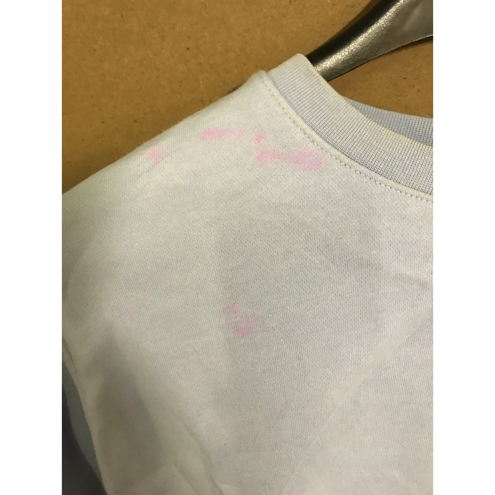 Nike Crewneck Pullover Sweatshirt Lilac Women's Medium closeup of pink stain