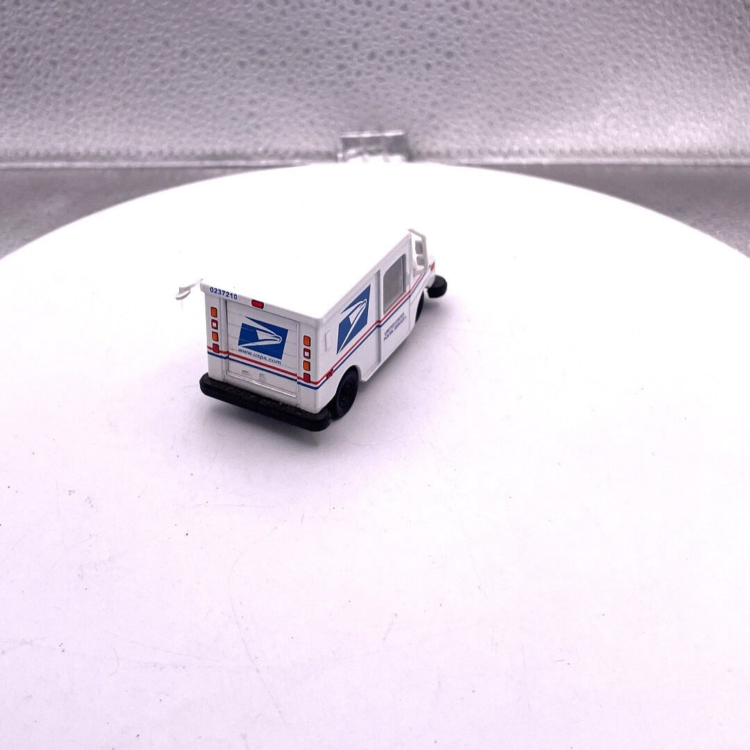 Greenlight Hobby Exclusive 2017 US Postal Vehicle, 1/64 Scale, GL126
 rear/driver's side view