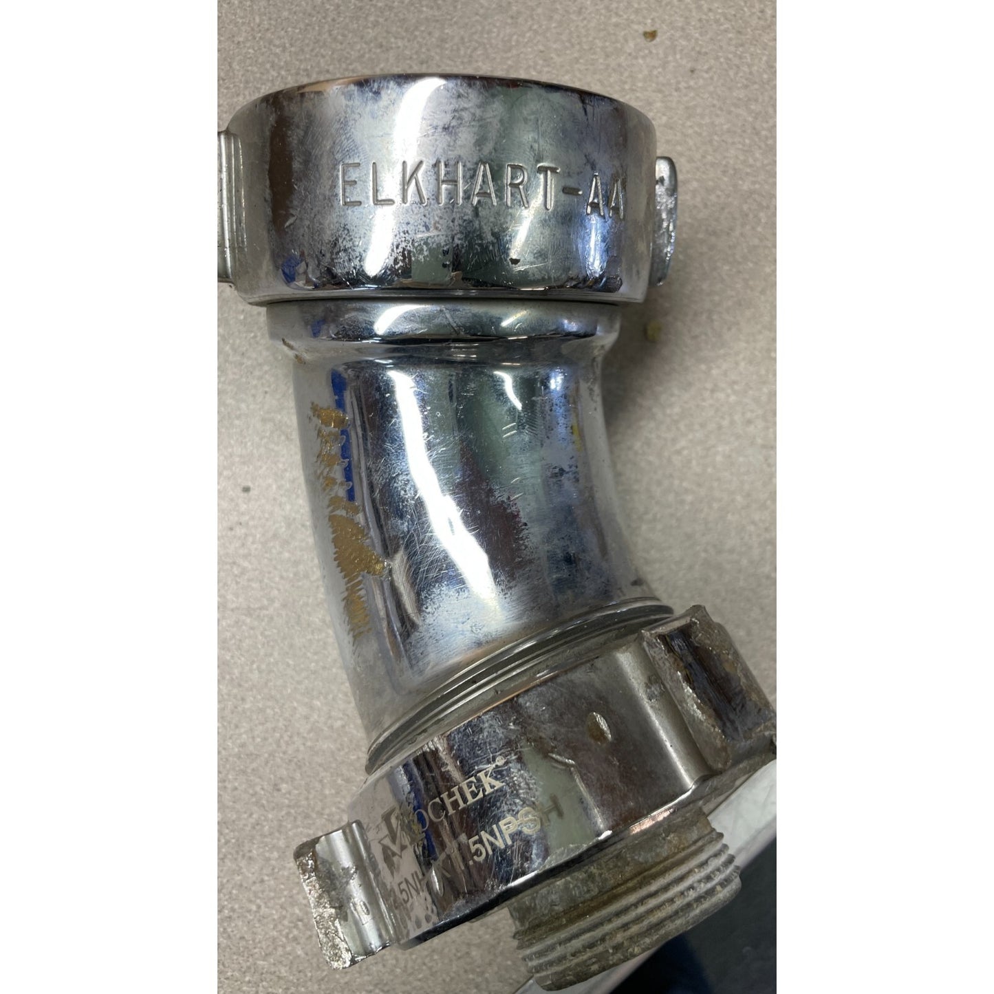 Kochek 5NHX 1.5NPSH elbow side view with manufacturer's stamp closeup