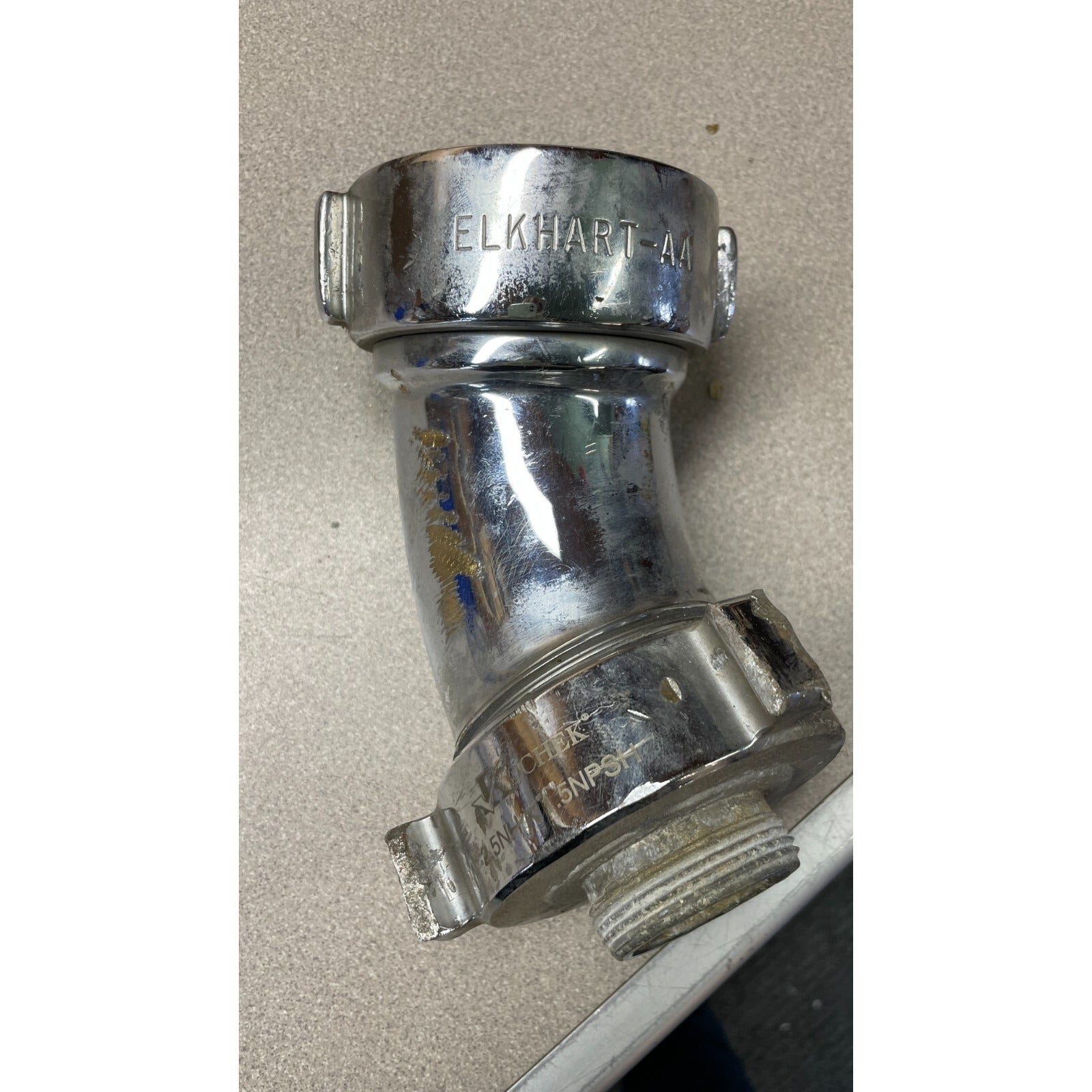 Kochek 5NHX 1.5NPSH elbow side view with manufacturer's stamp