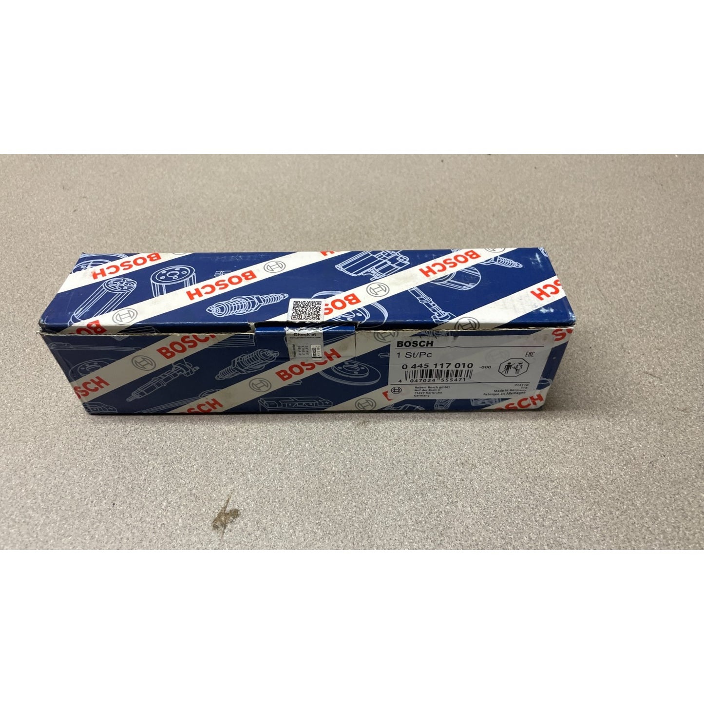 Bosch engine part packaging on a beige surface