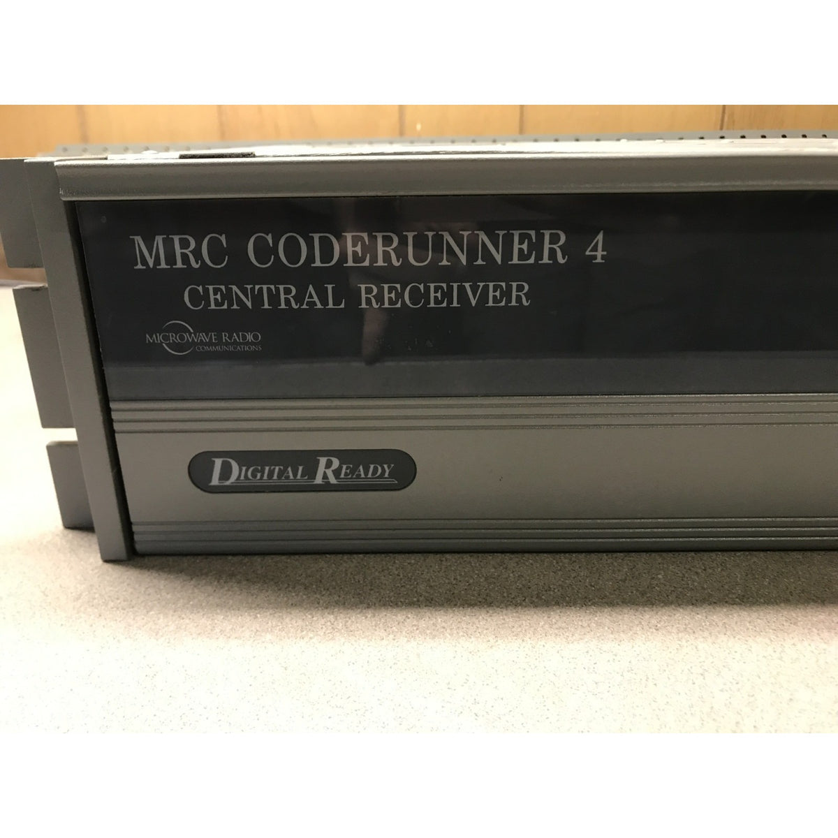 A MRC Coderunner 4 Central Receiver amplifier by Microwave Audio, featuring a dark gray and black front panel with silver lettering and a 'Digital Ready' badge.