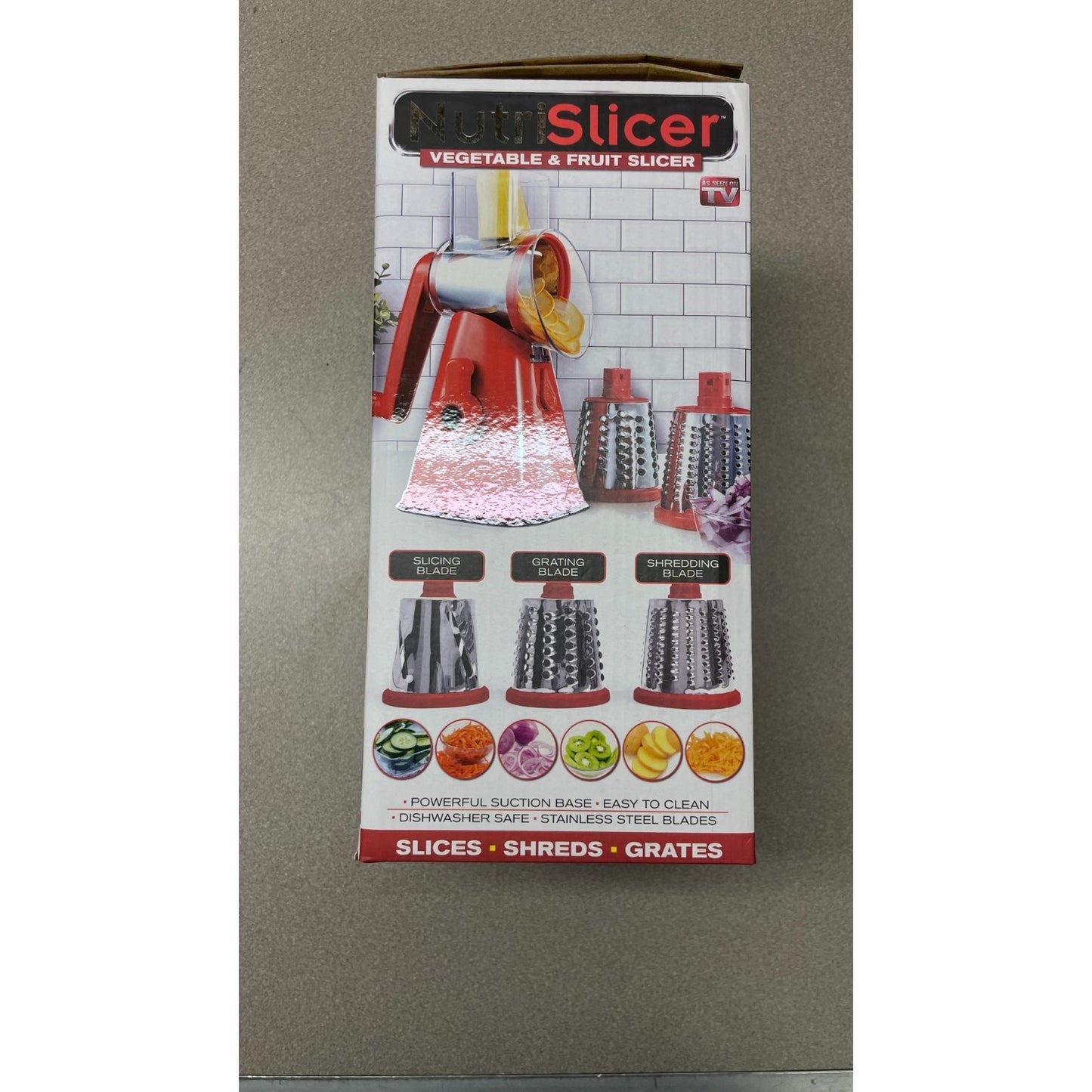 Box of a vegetable and fruit slicer with images of the product on a gray background