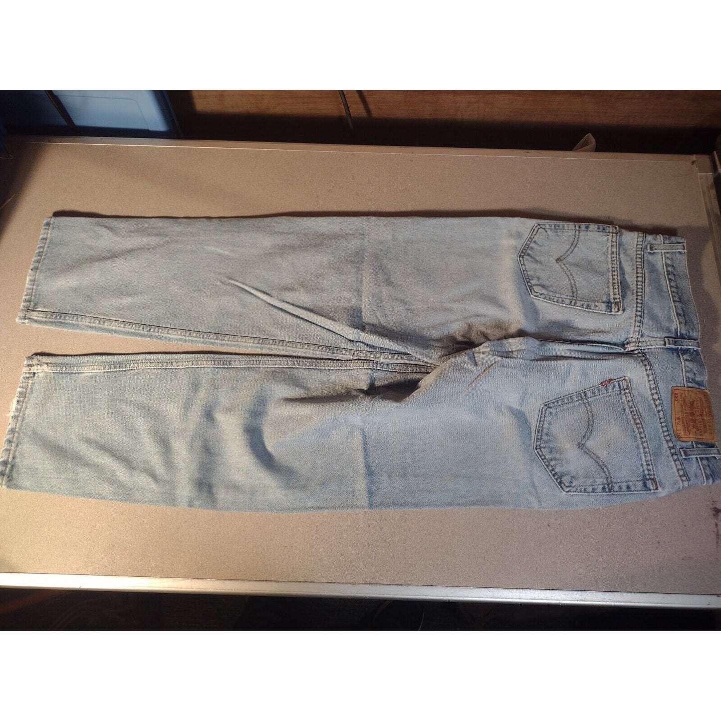 Levi's Strauss & Co Relaxed Fit Light Blue Jeans W34 L32 back of pants