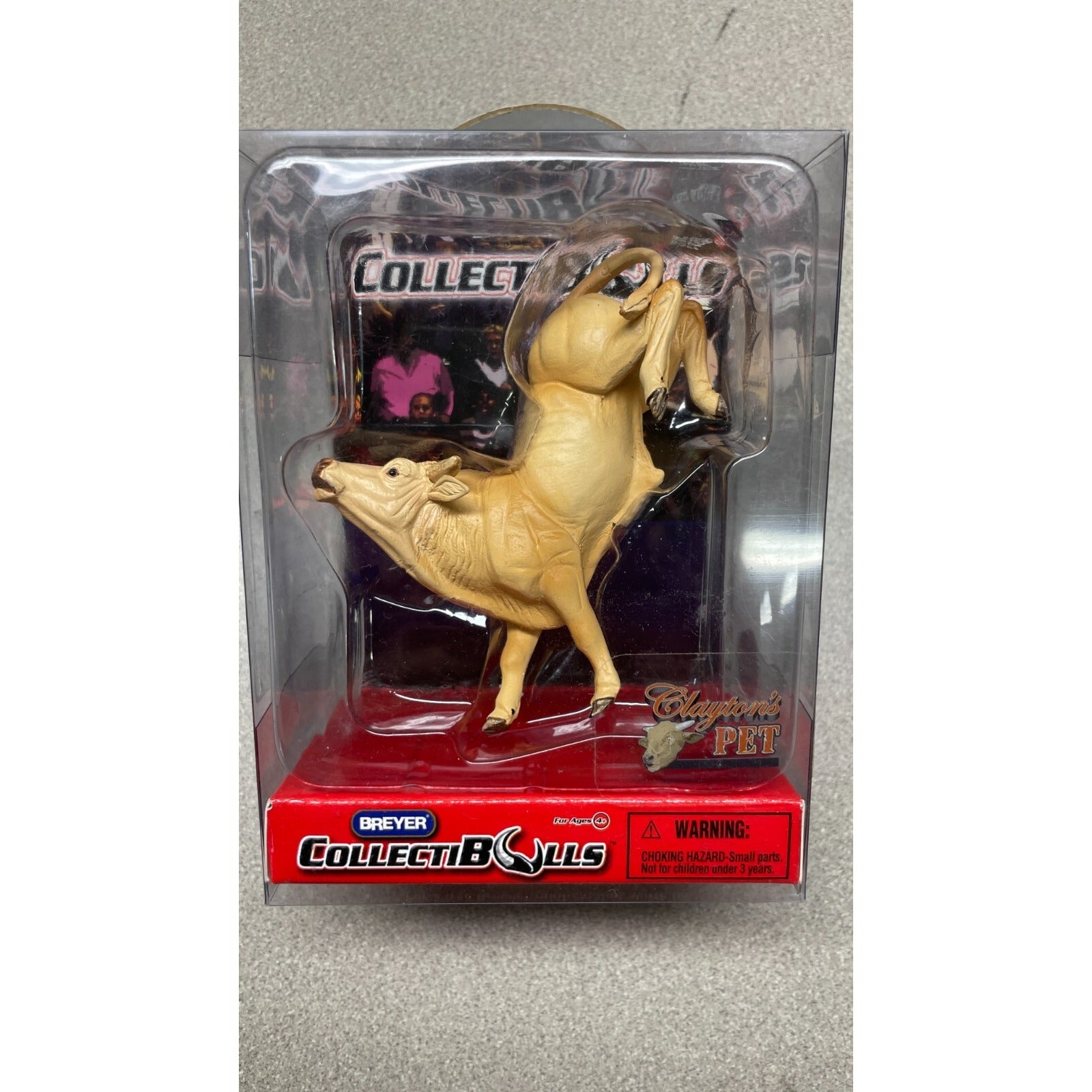 Breyer CollectiBulls Clayton's Pet front of packaging displaying item