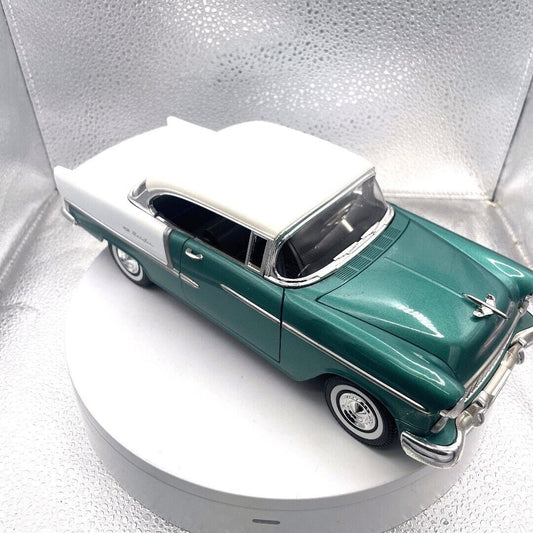 Motormax 1955 Chevrolet Bel Air Green Die Cast Convertible, 1/18 Scale, No. 73184 passenger/front view