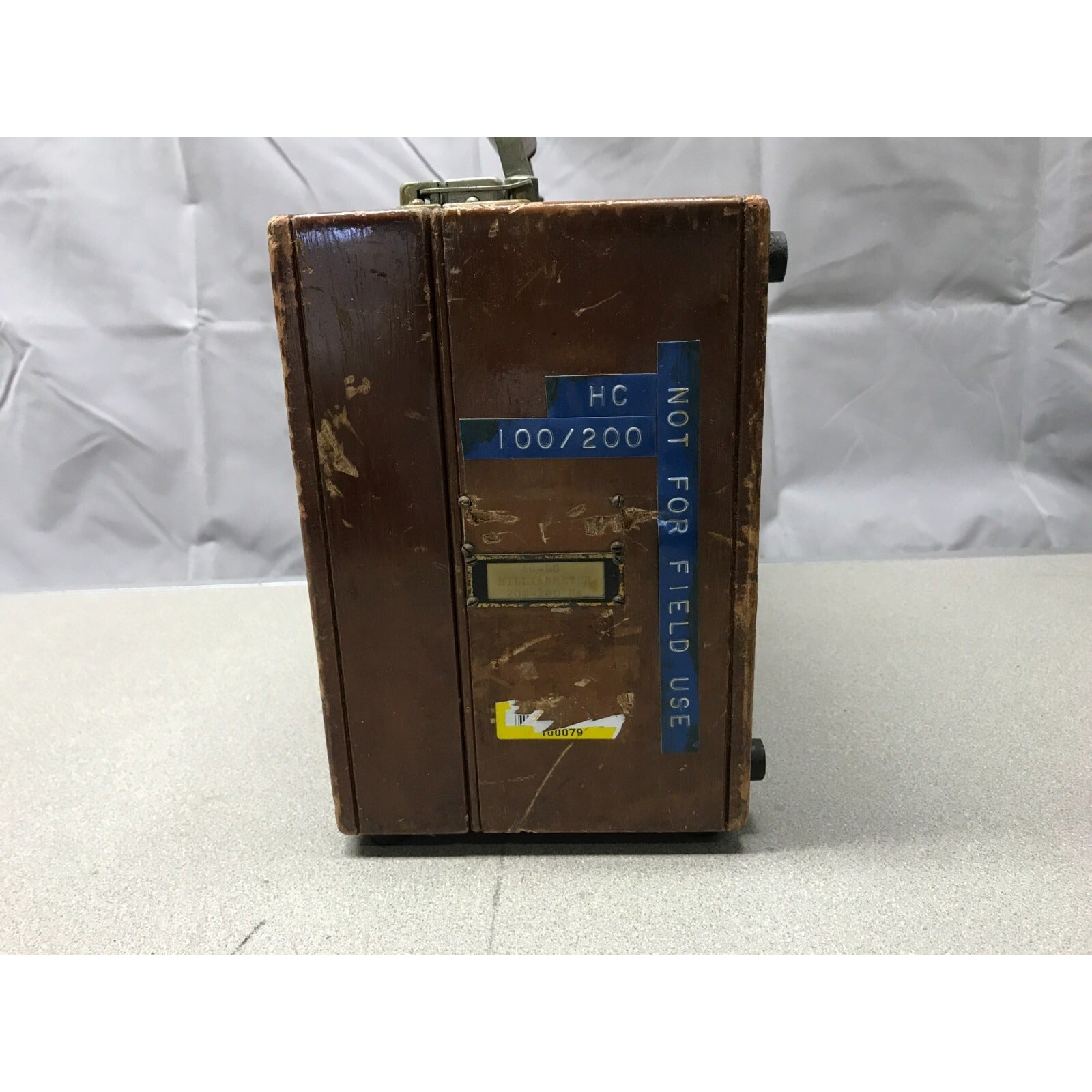 Vintage 1953 Weston A.C. & D.C. Milliameter Model 370 side view of case with labels "not for field use"