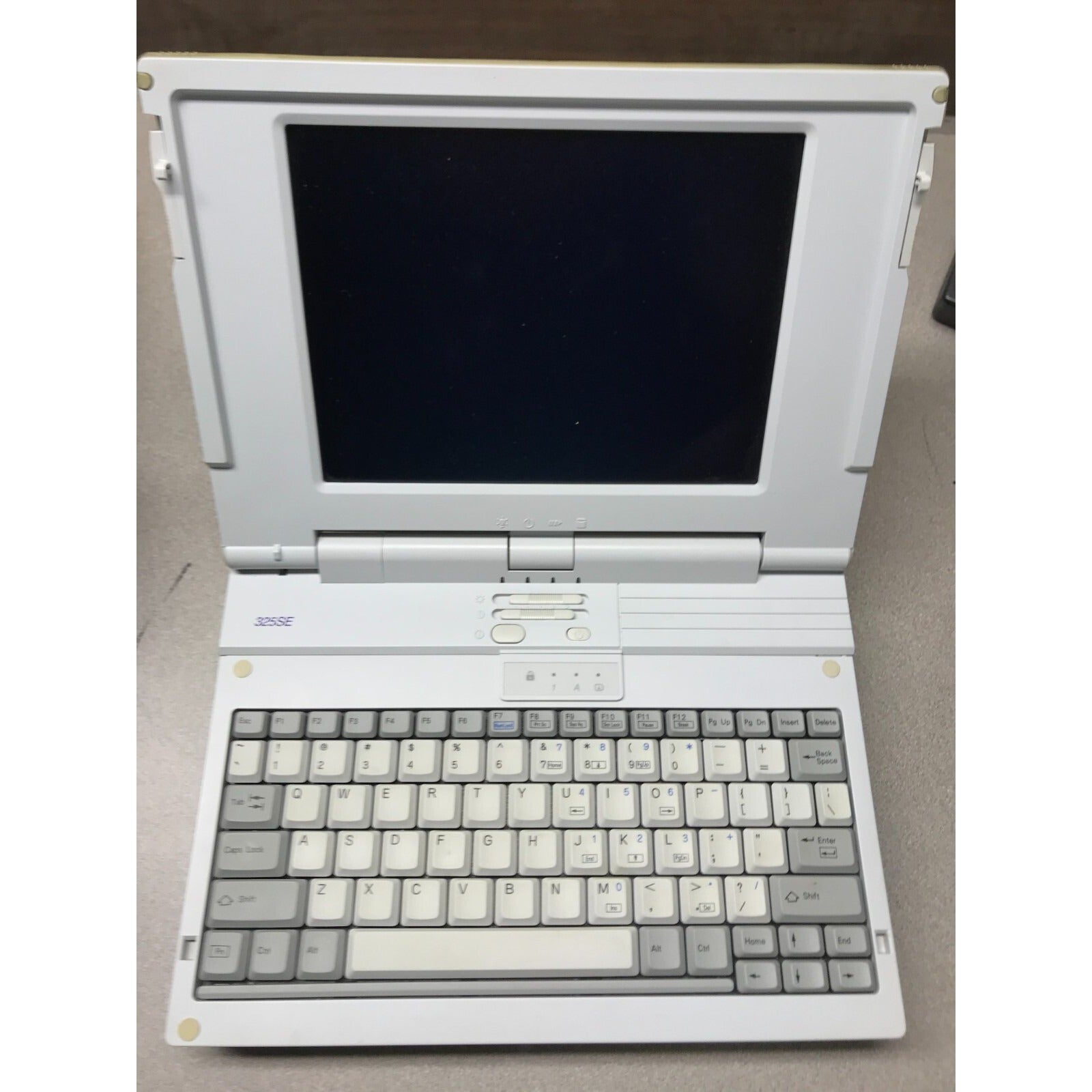 Acros 325SE Computer - Includes various cables and Leather Carrying Bag full view laptop open