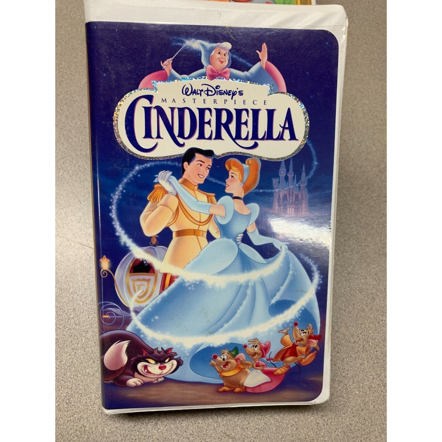 VHS tape cover of Disney's Cinderella on a beige background