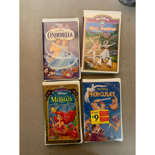 Disney VHS Masterpiece Collection set of 4 - Hercules (sealed!), Mary Poppins, Cinderella, and The Little Mermaid front of 4 video cases