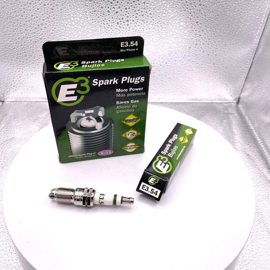 E3 Spark Plugs packaging and a single spark plug on a white background