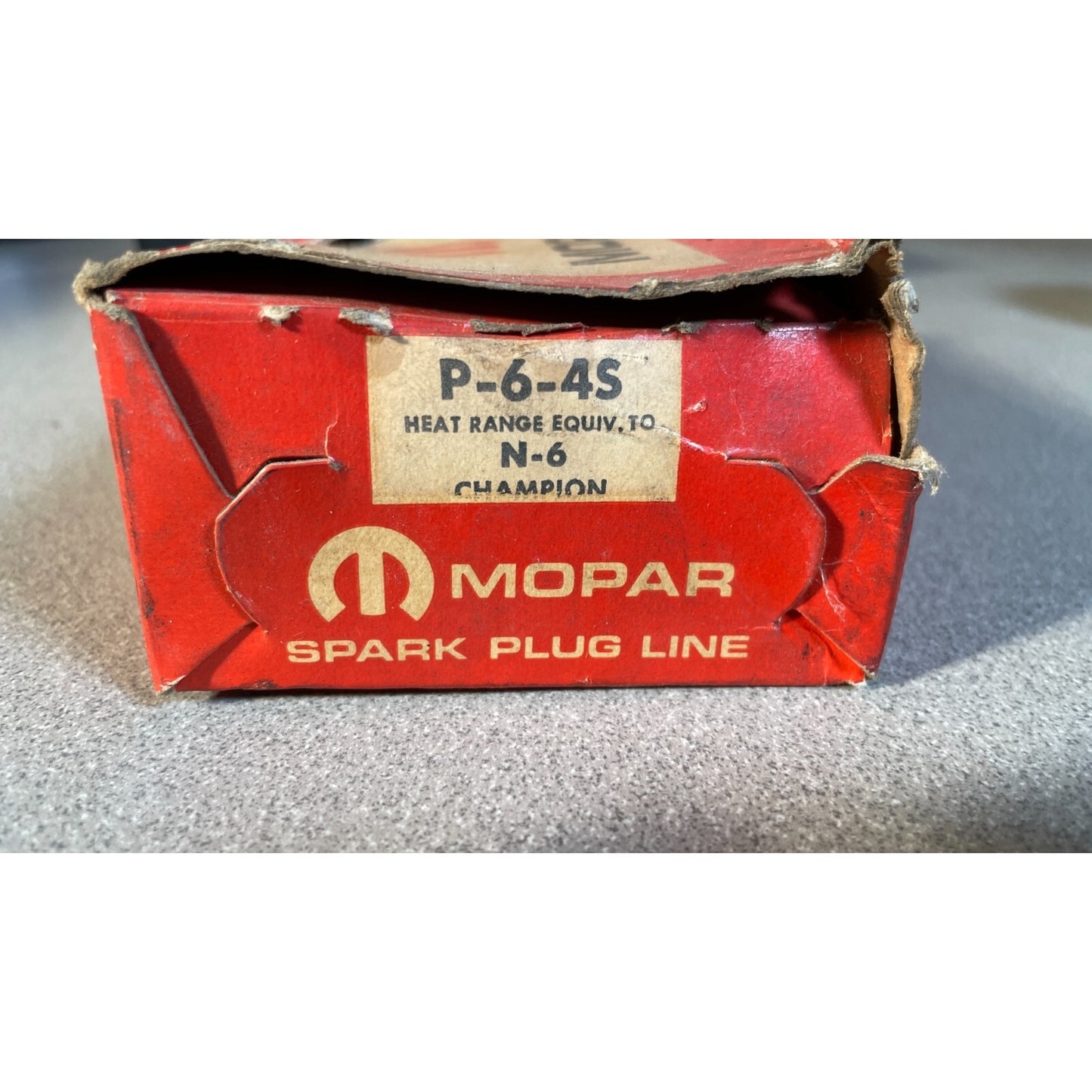 Mopar P-6-4S N-6 Champion Spark Plugs - Pack of 10 top of box with part number 
