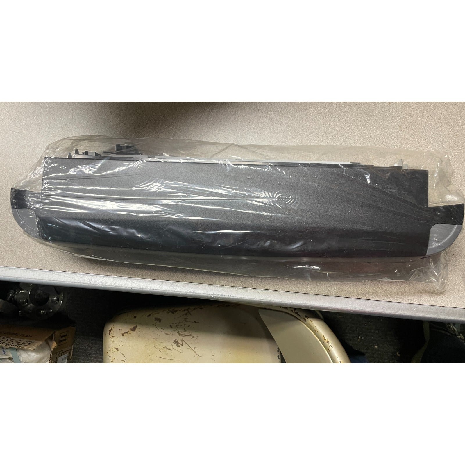 Epson Automatic Roll Paper Cutter top view in plastic packaging