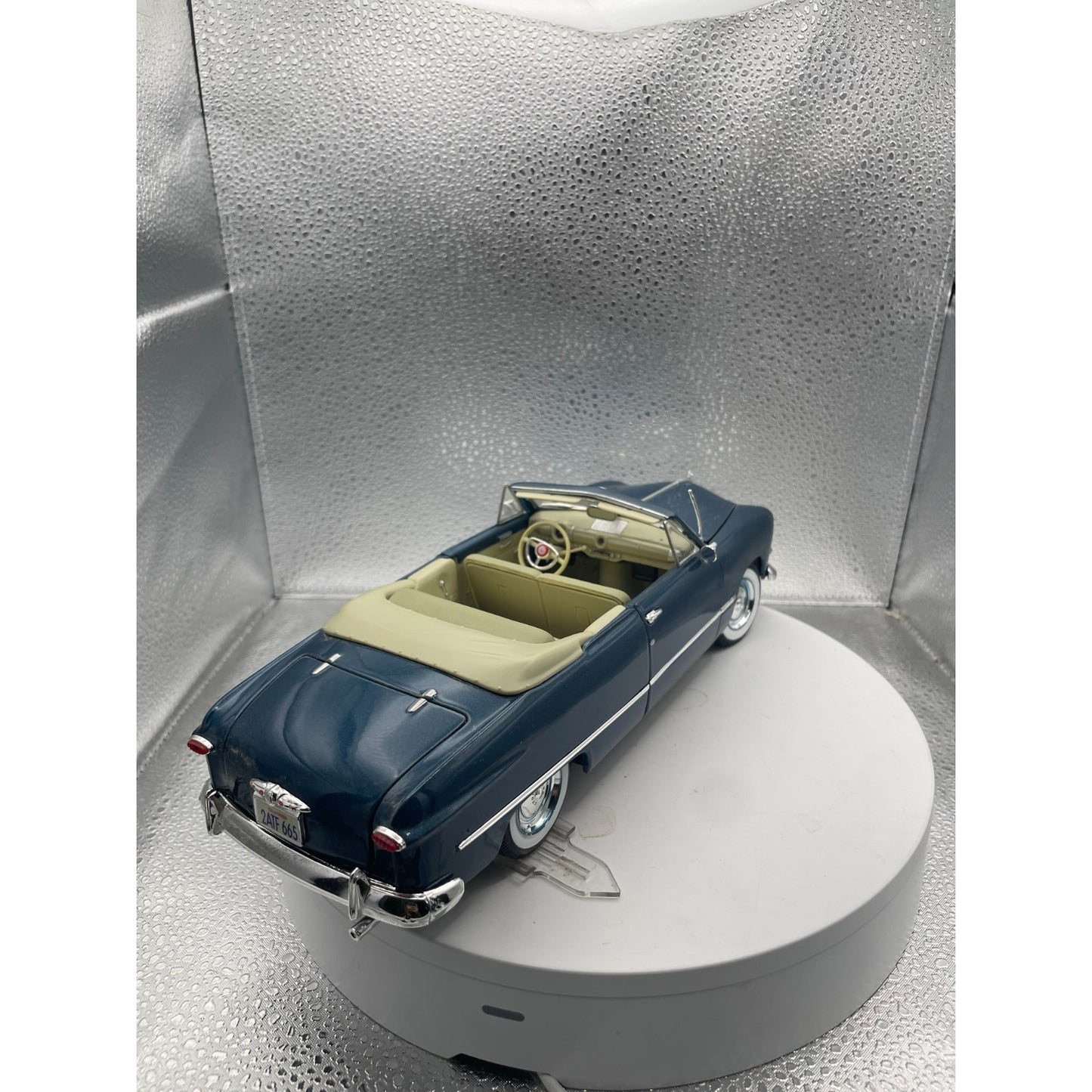 Maisto 1949 Ford Blue Convertible Die Cast, Scale: 1/18, 11322 back end/passenger side view