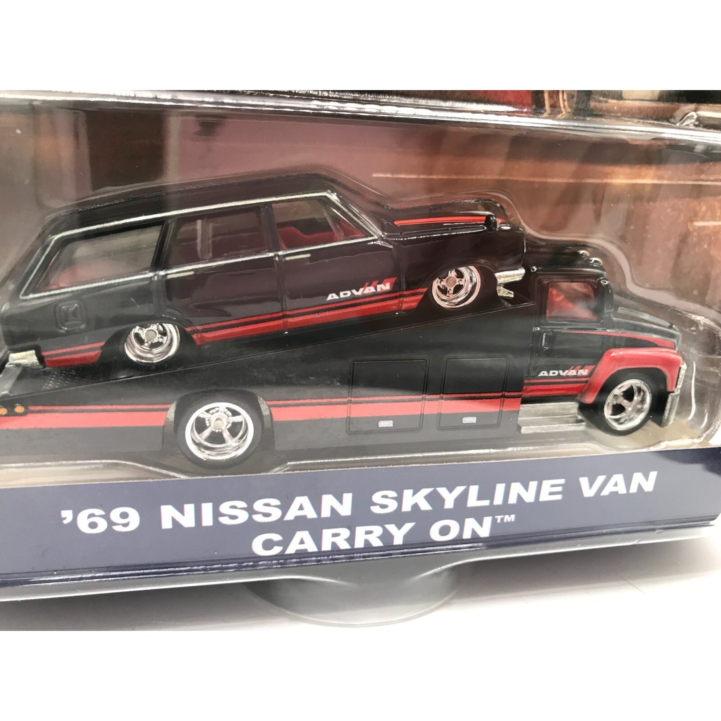 Hot Wheels Team Transport '69 Nissan Skyline Van Carry On closeup of car in package