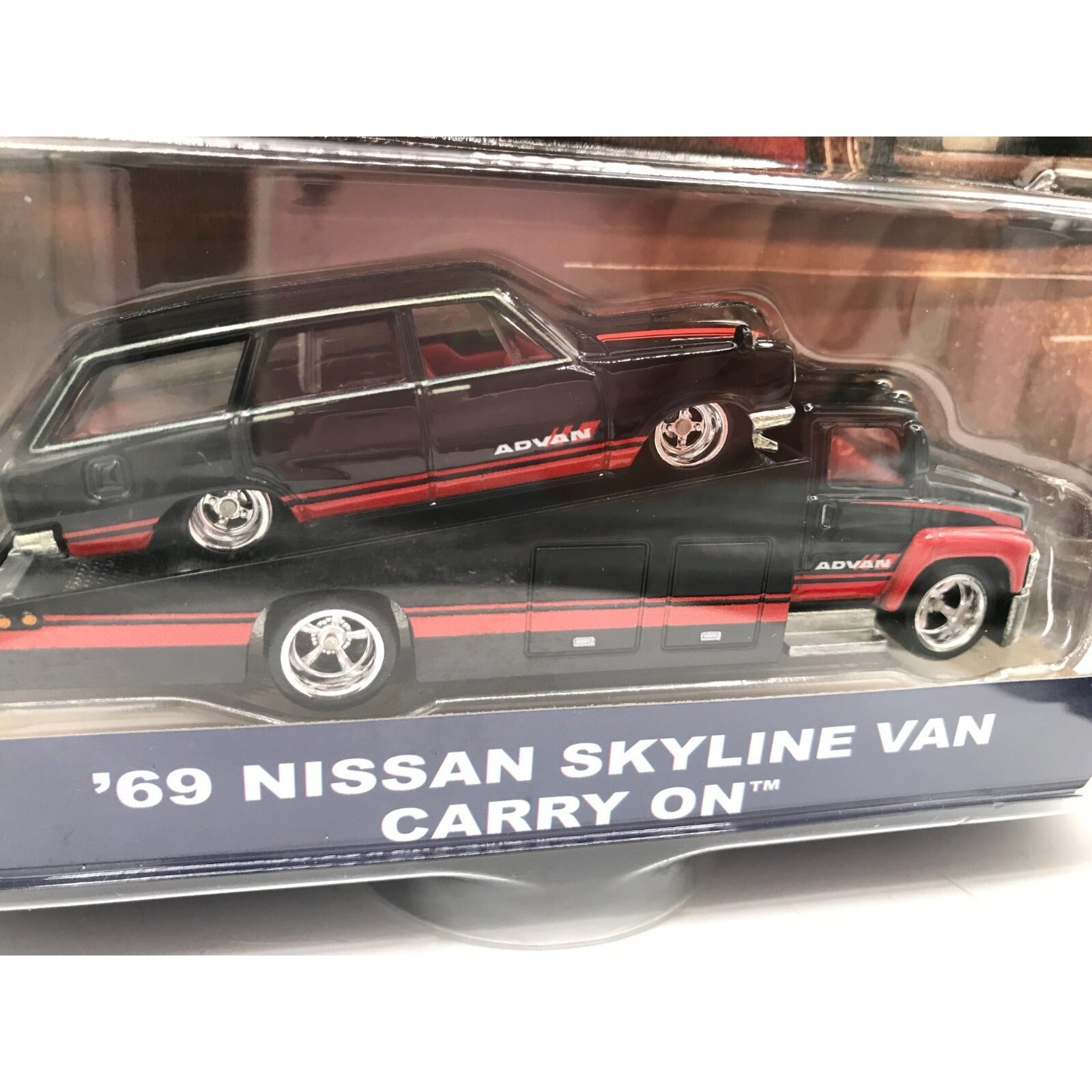 Hot Wheels Team Transport '69 Nissan Skyline Van Carry On closeup of car in package