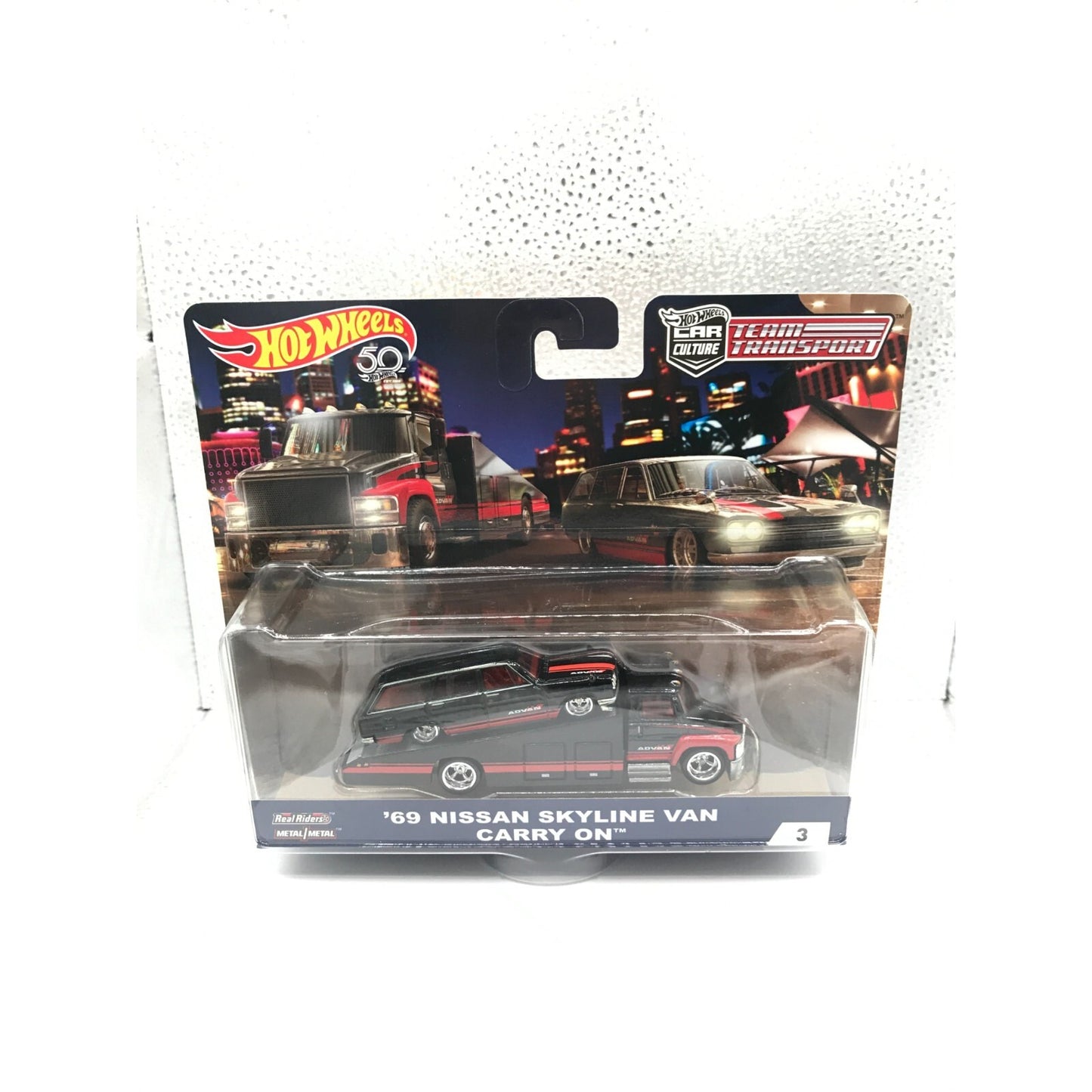 Hot Wheels Team Transport '69 Nissan Skyline Van Carry On front of package displaying car
