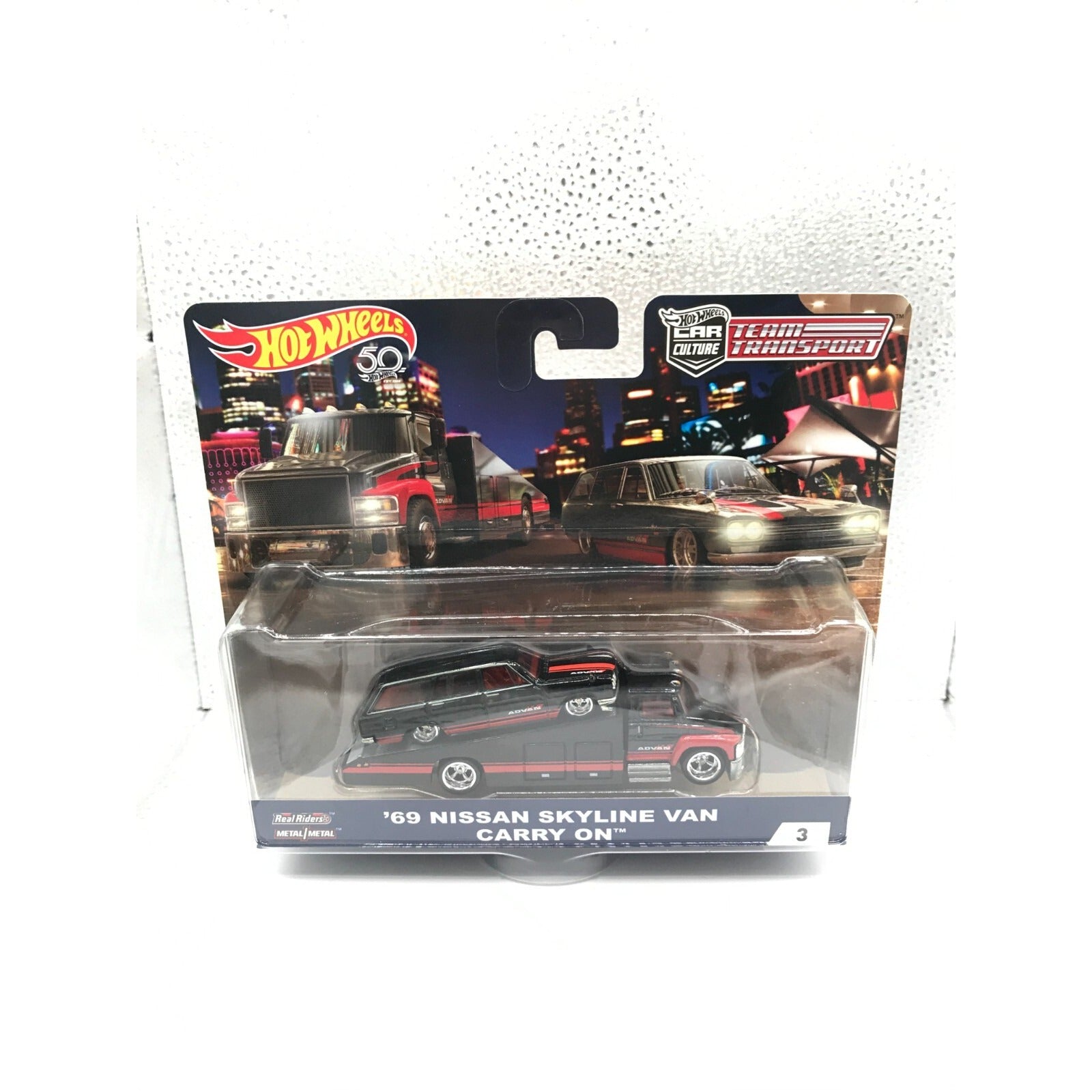 Hot Wheels Team Transport '69 Nissan Skyline Van Carry On front of package displaying car