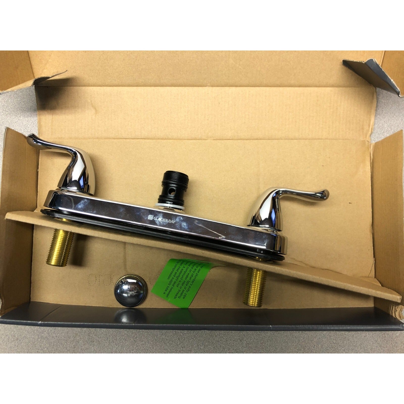 Glacier Bay Chrome Faucet Handles and Gasket (Faucet not Included) front view in packaging