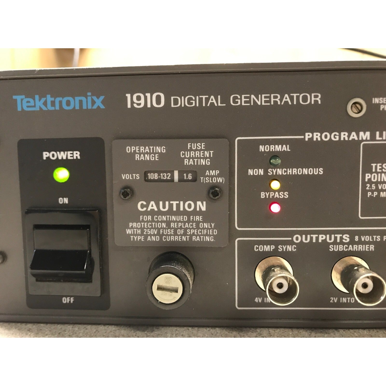 Tektronix 1910 Digital Generator panel close up power ,connectors, status lights