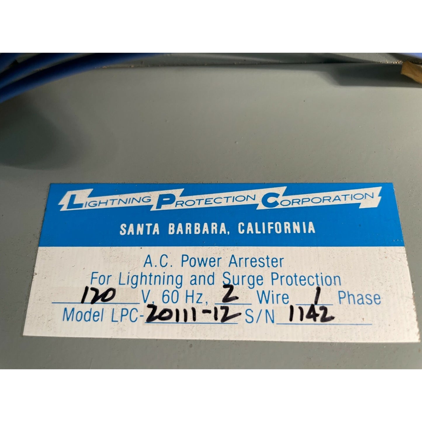 Label from Lightning Protection Corporation on a power arrester device