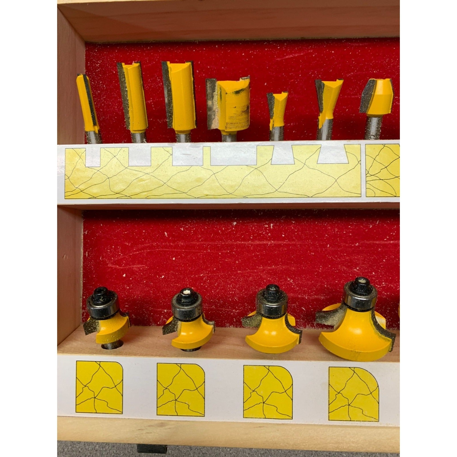 24pc Router Bit Set Carb-Tech closeup of bits in case with diagram of bit shape below bit