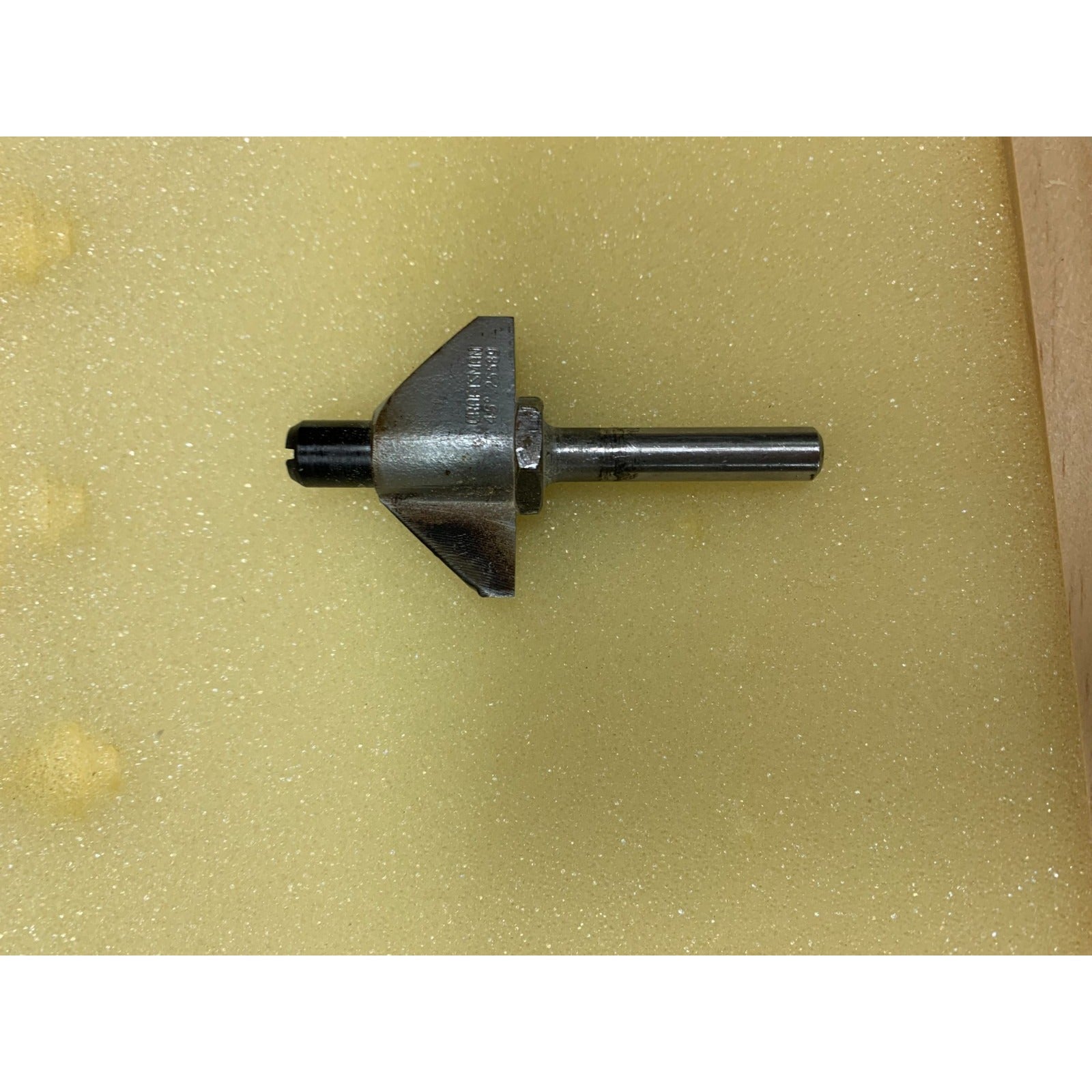 Closeup of extra router bit included