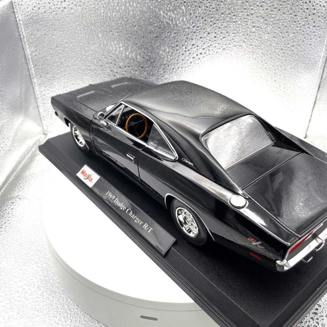 Maisto 1969 Dodge Charger R/T Black Die Cast with Base, Scale: 1/18 driver's side/rear view