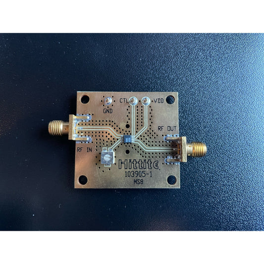 Hittite microwave component on a dark blue background