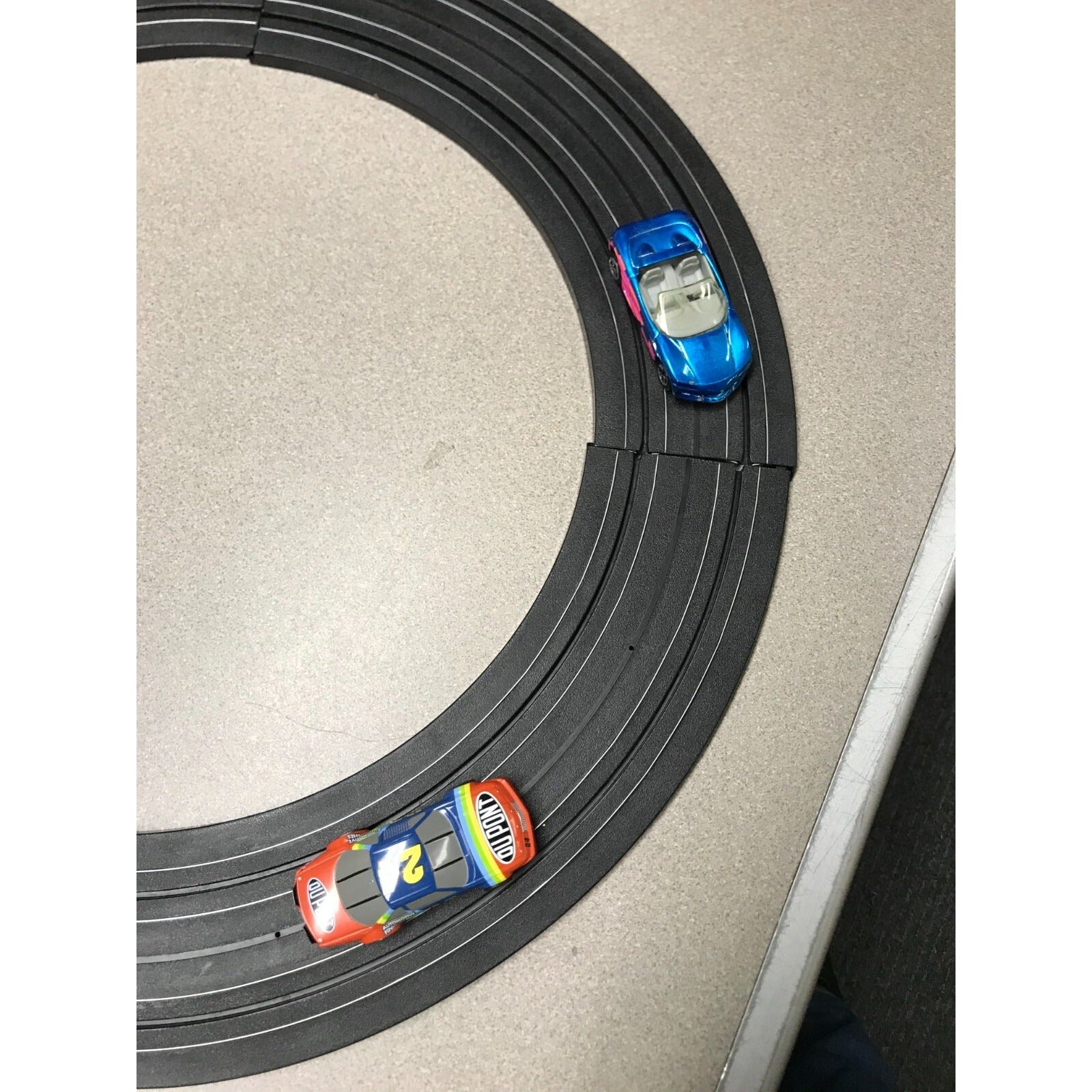 Nascar battery operated racetrack with cars track and cars closeup