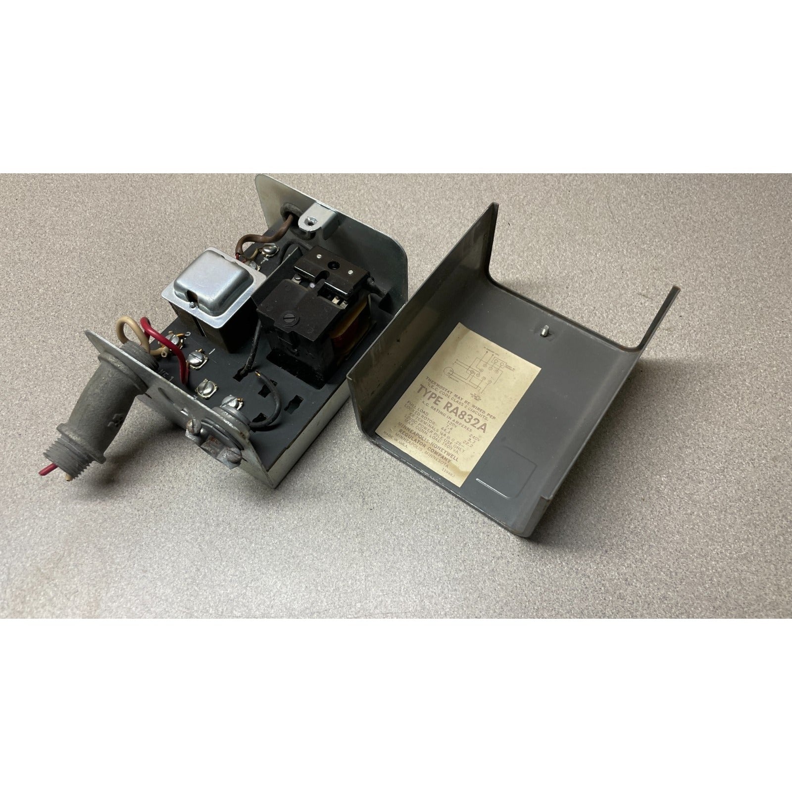 Honeywell Switching Relay RA832A relay with cover off showing internal components and wiring.