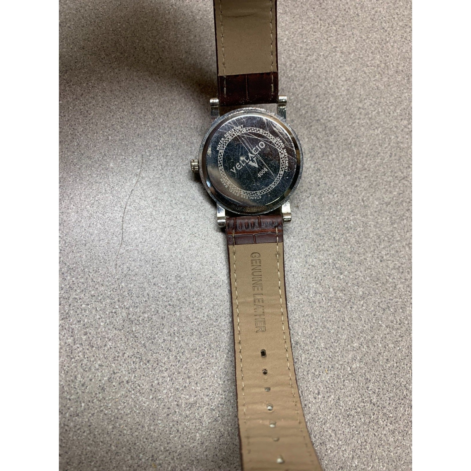Vellacio Men's Watch 4004 Quartz Water Resistant on Genuine Leather Band back of watch small scratches 