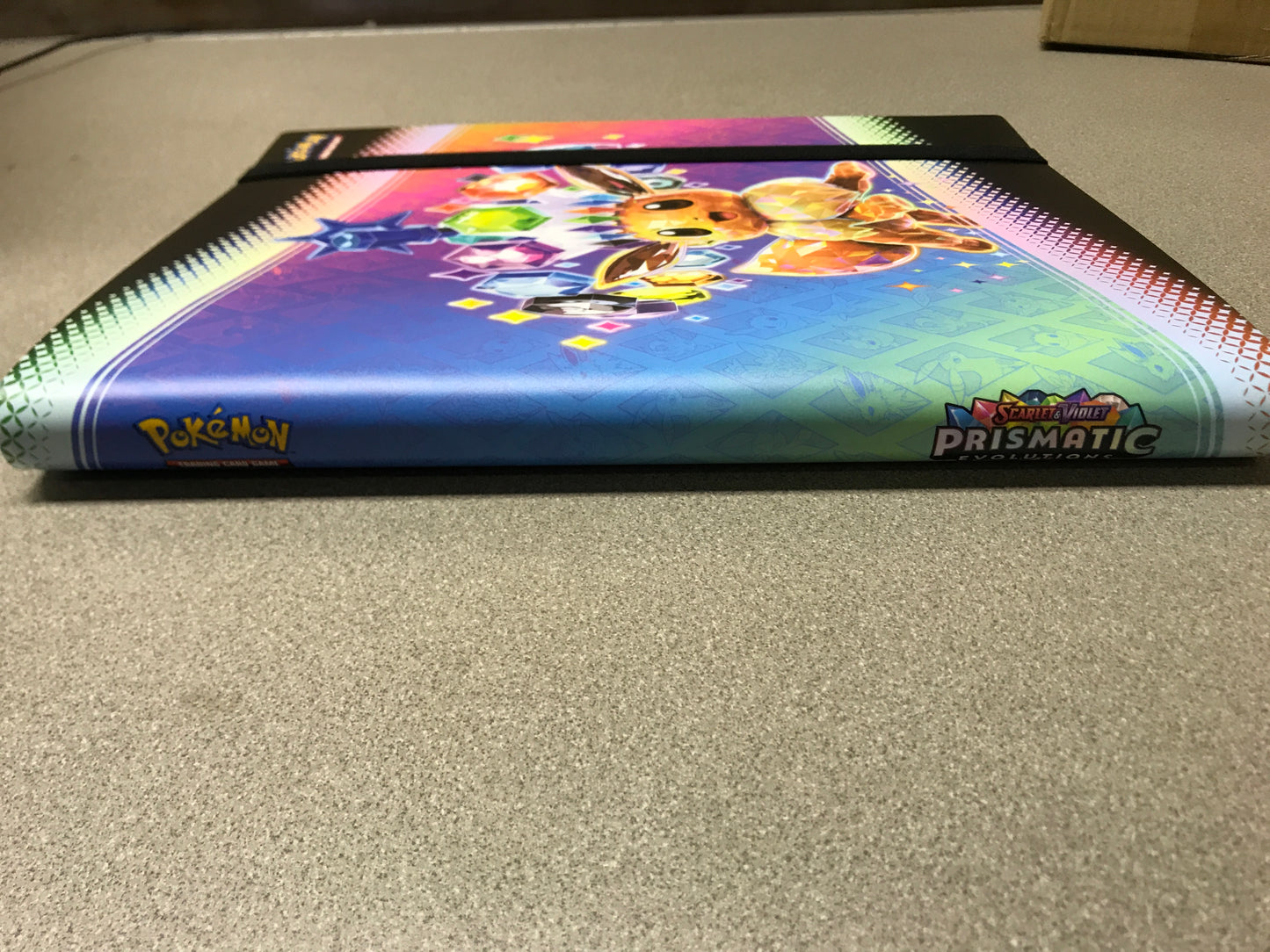Pokemon Prismatic Evolutions Binder Eeevee 2025 Scarlet and Violet side binding