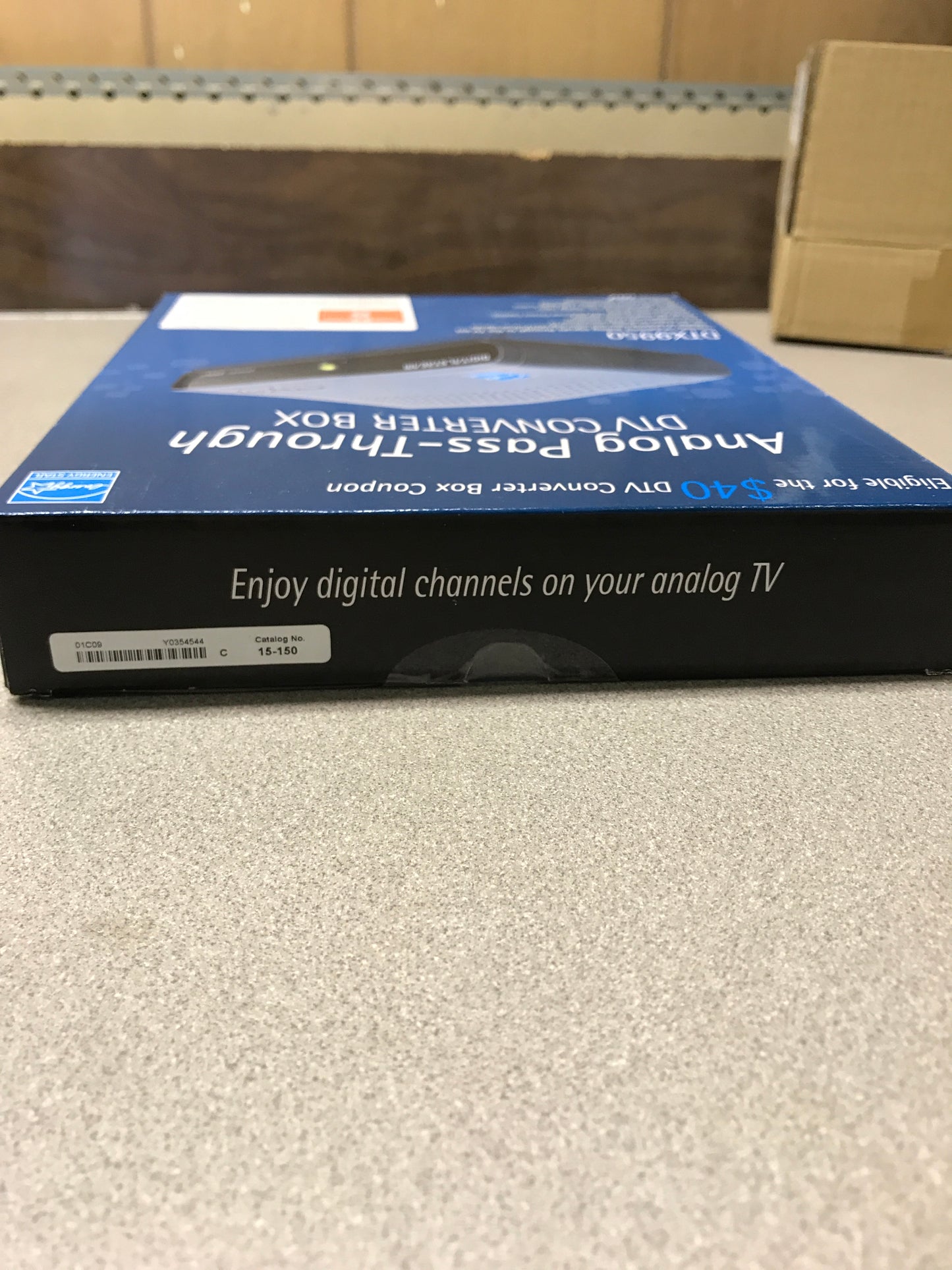 DTX9950 Analog Pass-Through DTV Converter Box top of box