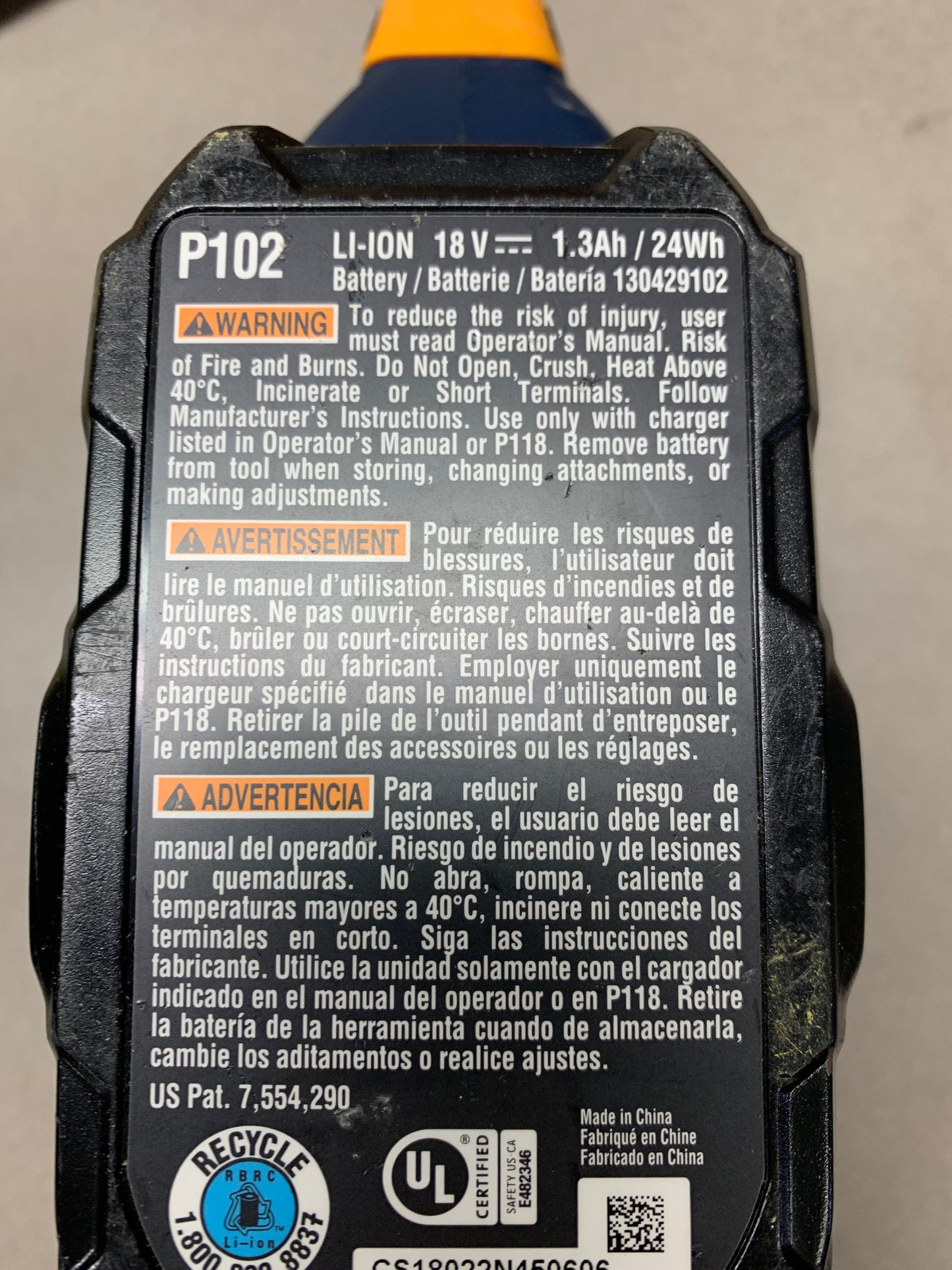 Ryobi Cordless Staple Gun P301 with Battery 18V Electric closeup of battery label