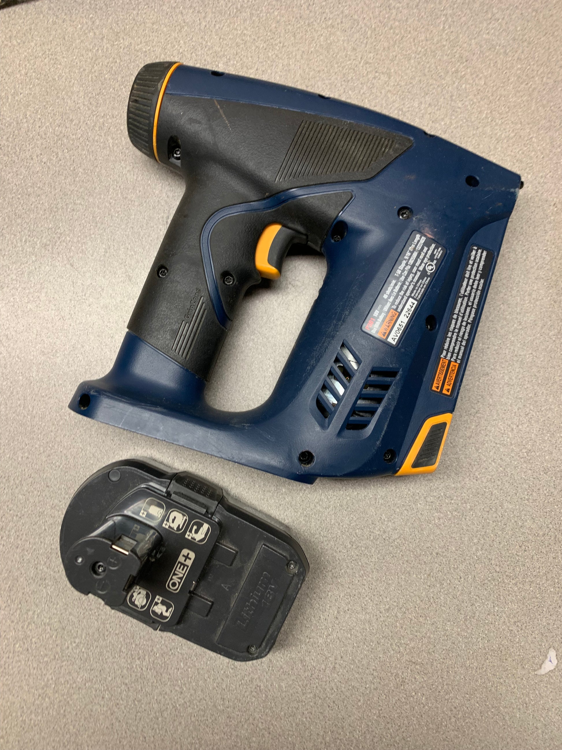 Ryobi Cordless Staple Gun P301 with Battery 18V Electric side view of staple gun with battery not attached
