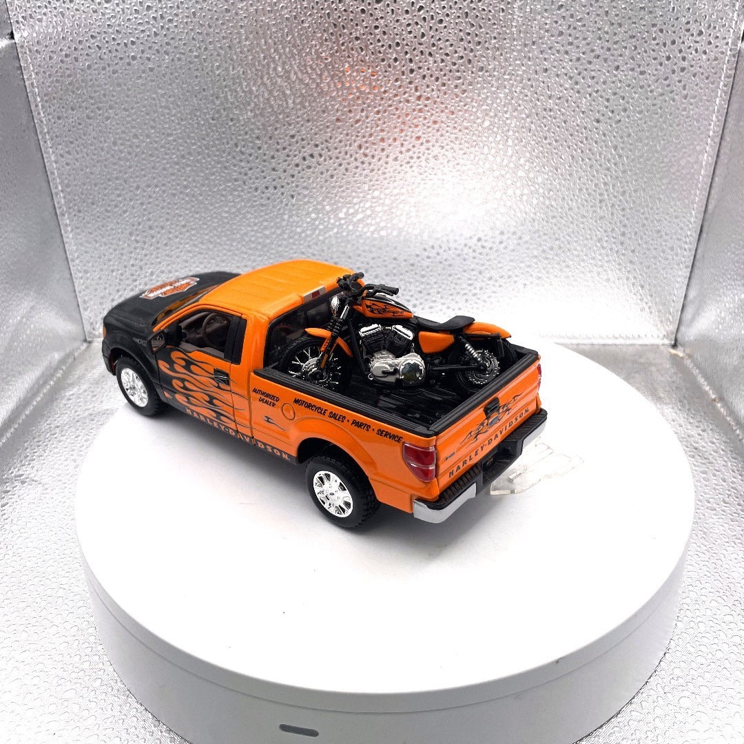 Maisto 2010 Ford F-150 STX Harley Davidson Die Cast with Motorcycle, Scale: 1/27, No. 01618 drivers side/back end/bed view with motorcycle 