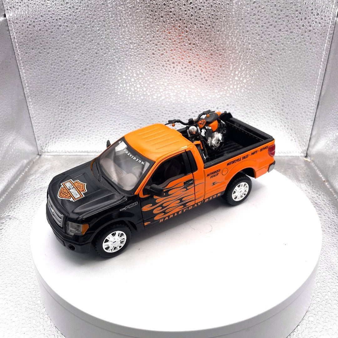 Maisto 2010 Ford F-150 STX Harley Davidson Die Cast with Motorcycle, Scale: 1/27, No. 01618 front end/drivers side view with motorcycle in bed