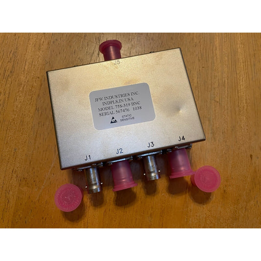 JFW Industries Inc Model 75S-319 BNC Splitter top view with product label